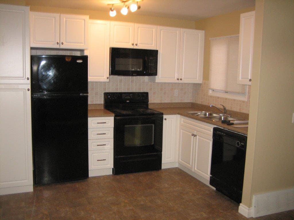 SUBURBAN CHIC ~ Fully Upgraded Home with NEW KITCHEN & Bonus Basement Development!